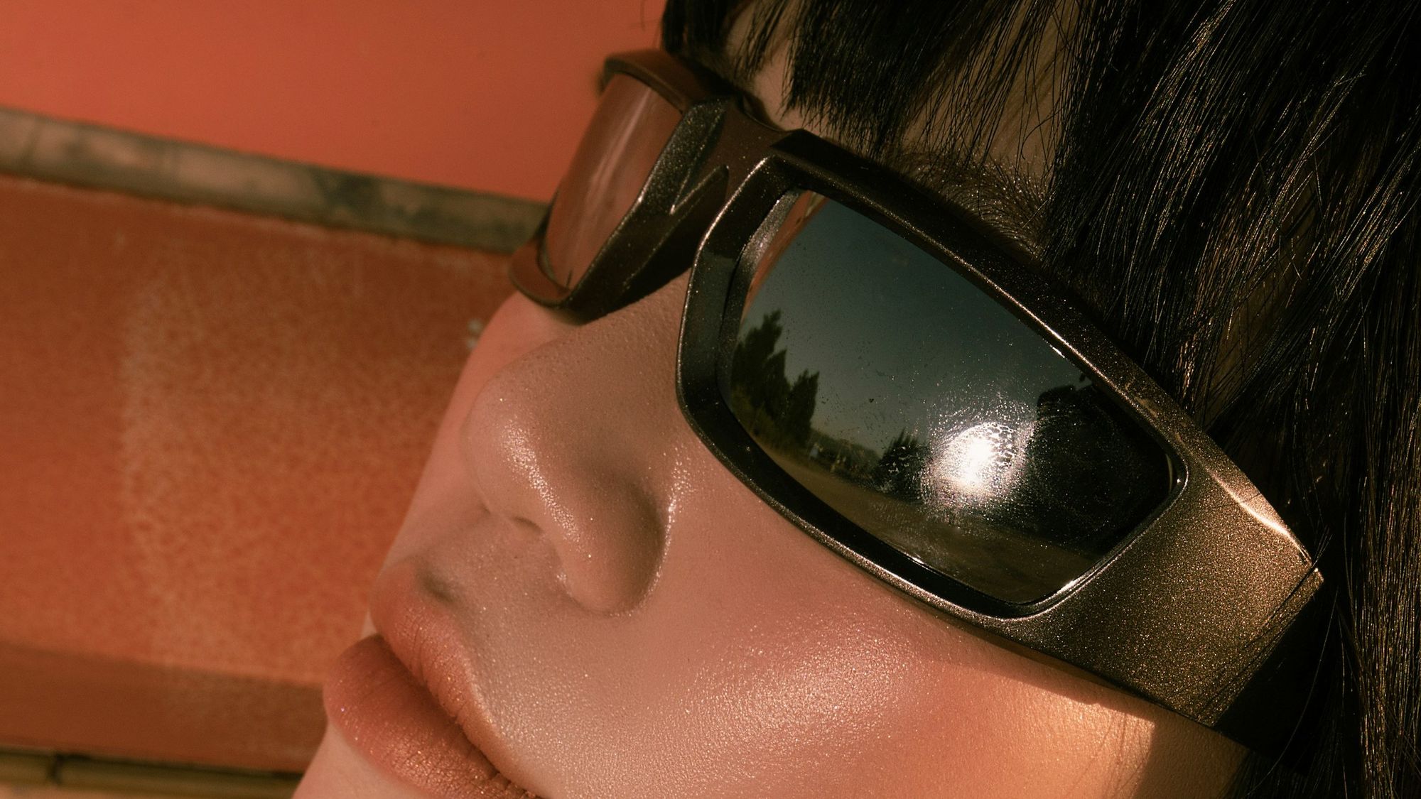 Close-up of a woman wearing sunglasses